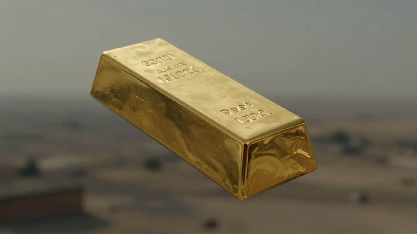 Gold bar with a downward shadow, Middle Eastern landscape background.